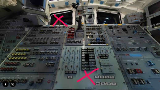 The interior of one wall of the space shuttle Atlantis main flight deck, with the upper left window and low center control panel each annotated with a hot pink "x".